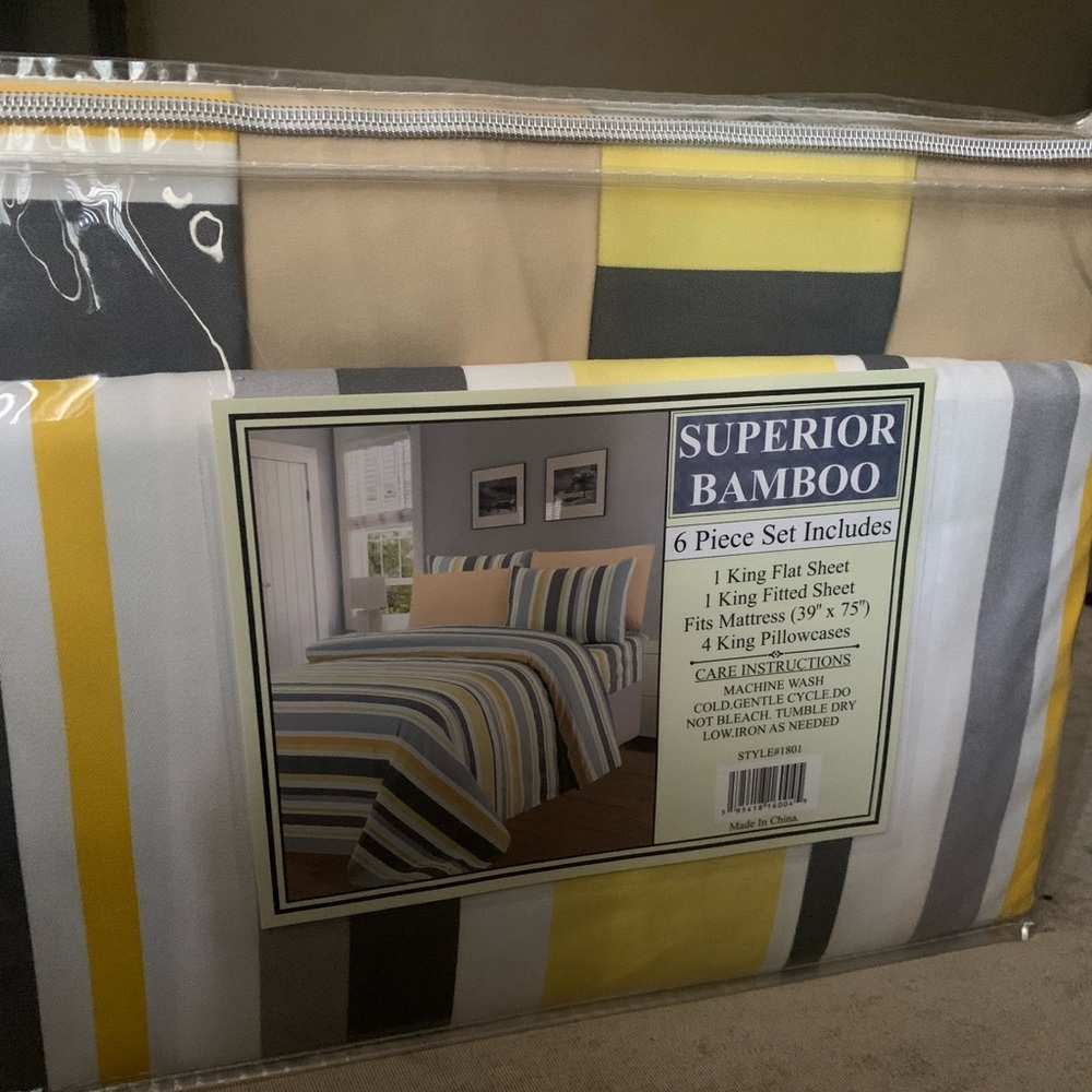 KING SIZE fitted sheet and flat sheet with four pillow cases.